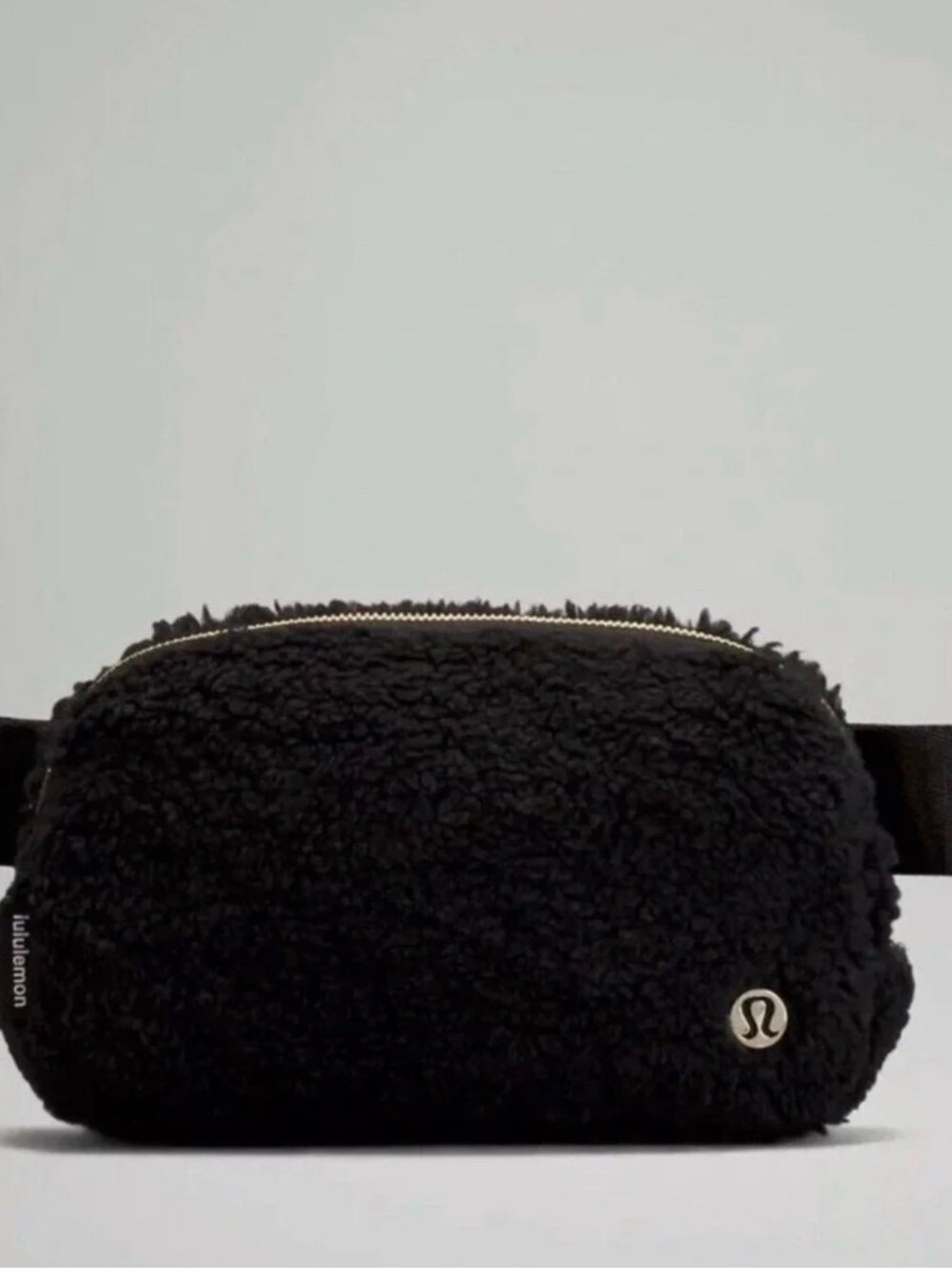 lululemon black sherpa belt pouch with gold zipper